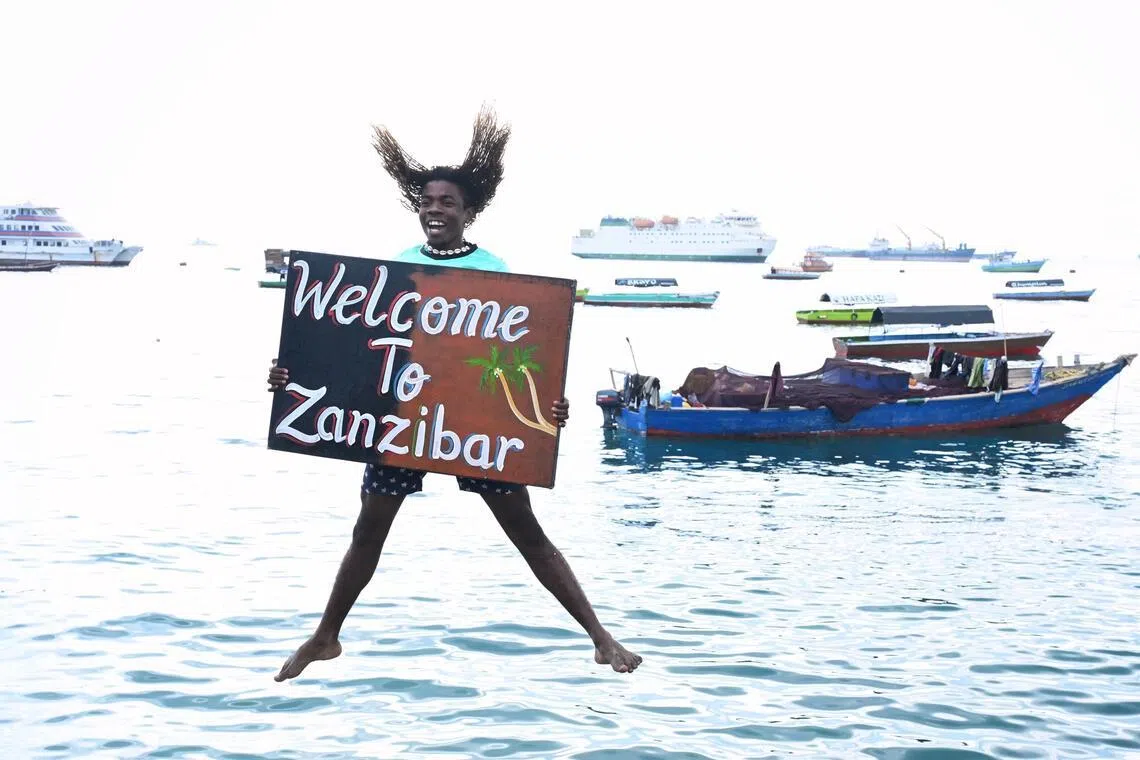 A group of locals welcomed President Tharman Shanmugaratnam and his spouse Jane Ittogi Shanmugaratnam by diving into the sea in Stone Town in Zanzibar, Tanzania, on June 10.