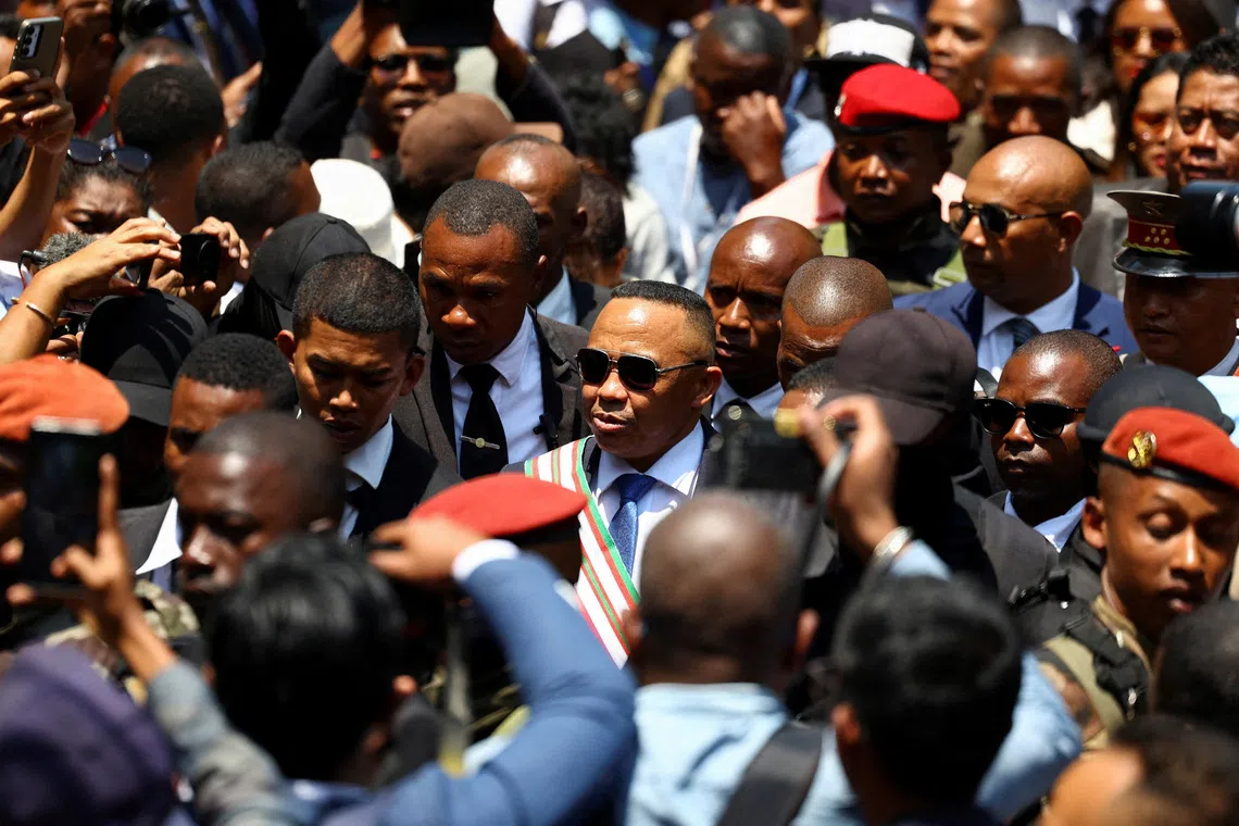 Madagascar's new military ruler, Colonel Michael Randrianirina, leaves after being sworn in as president on Friday, taking over from Andry Rajoelina following a coup that ousted him, at the constitutional court in Antananarivo, Madagascar, October 17, 2025. REUTERS/Siphiwe Sibeko