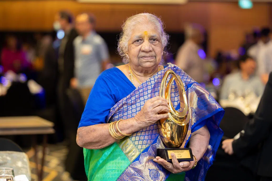 CMG20230127-jkwan01/关俊威/安诗一/Ministry of Social and Family Development Volunteer and Partner Awards 2023 - 2023 as Year of Celebrating Social Service Partners [Suntec Singapore Exhibition and Convention Centre Summit Hall, Level 3] The top award, the Outstanding Lifetime Volunteer Award, was presented to Mdm Sartha, 83, who is one of Singapore’s longest-serving foster parents. She has been a foster parent for more than 45 years and has cared for 12 children.