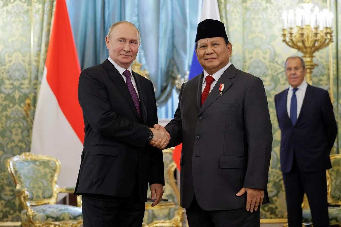 Russian President Vladimir Putin shakes hands with Indonesian President-elect Prabowo Subianto during a meeting at the Kremlin in Moscow, Russia July 31, 2024. REUTERS/Maxim Shemetov/Pool