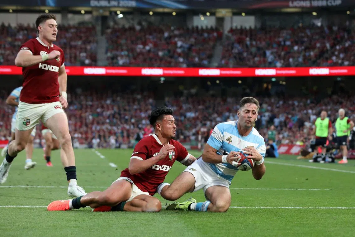 Argentina's Santiago Cordero scoring the team's third try during the 28-24 warmup international rugby union win over the British and Irish Lions at Aviva Stadium in Dublin on June 20, 2025.