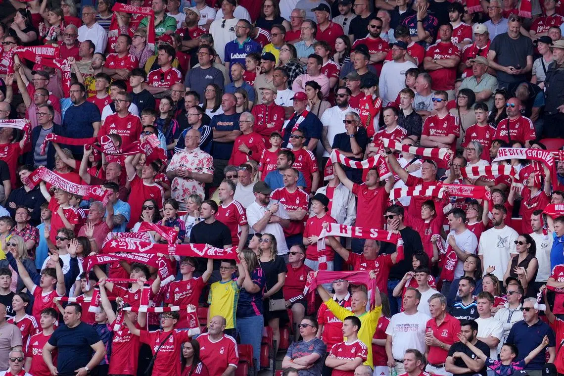 FILE PHOTO: Soccer Football - Premier League - Nottingham Forest v Leicester City - The City Ground, Nottingham, Britain - May 11, 2025 Nottingham Forest fans in the stands REUTERS/Maja Smiejkowska/File Photo
