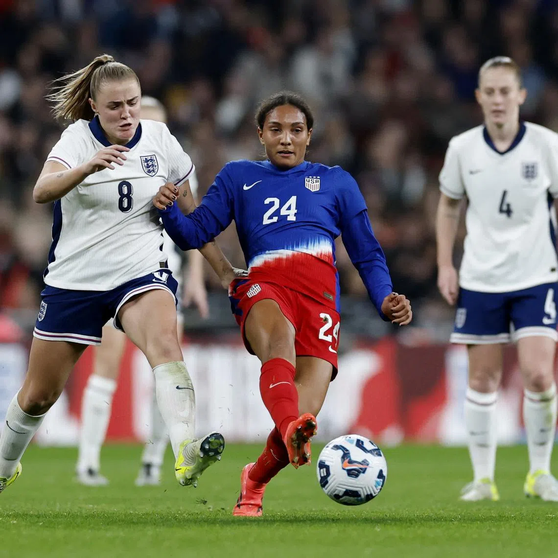 FILE PHOTO: Soccer Football - International Friendly - Women - England v United States - Wembley Stadium, London, Britain - November 30, 2024 England's Georgia Stanway in action with United States' Yazmeen Ryan Action Images via Reuters/Peter Cziborra/File Photo