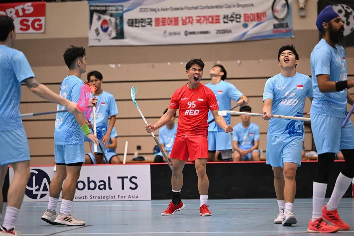 Man of the match Ethan Wong celebrates as his Singapore A team beat the Singapore B team 7-3 to secure a spot in the Asia Oceania Floorball Confederation Cup final.