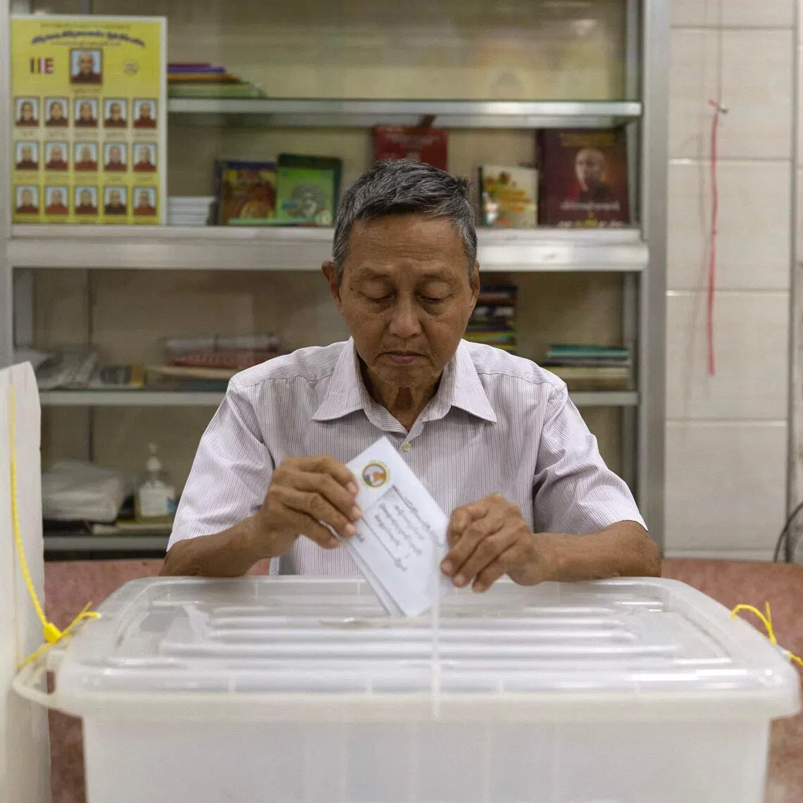 A man taking part in early voting in Yangon on Dec 26 ahead of the start of Myanmar's general election.