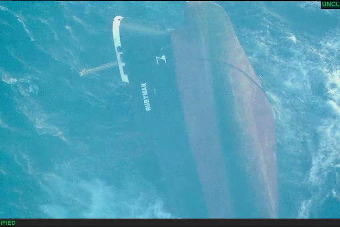 FILE PHOTO: The UK-owned vessel Rubymar, which had sunk in the Red Sea after being struck by an anti-ship ballistic missile fired by Yemeni Houthi militants, is seen in this aerial view released on March 3, 2024. U.S. Central Command/Handout via REUTERS THIS IMAGE HAS BEEN SUPPLIED BY A THIRD PARTY. TEXT OVERLAY FROM SOURCE./File Photo