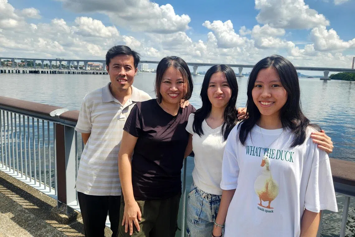 (From left) Mr Joash Liang and Ms Corrine Ang with their daughters Eleora and Elise. In pursuit of a slower, different lifestyle, they relocated first to Thailand, then to Malaysia in recent years.