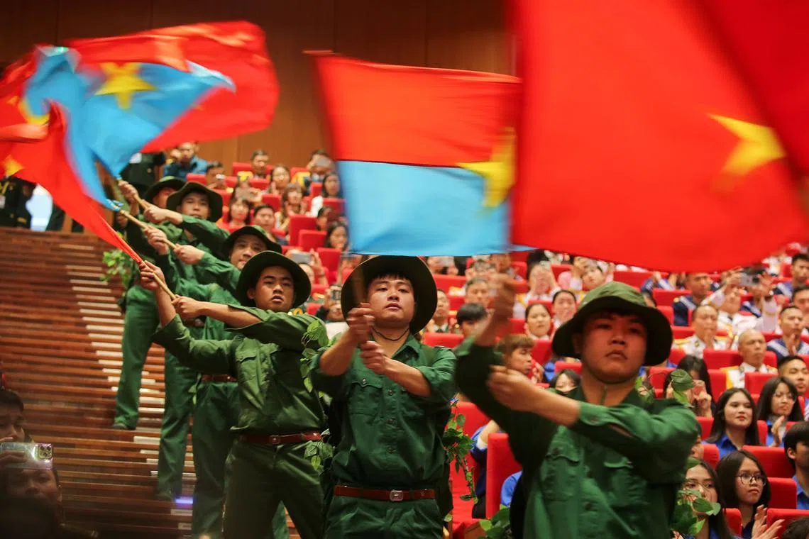 epa11786608 Artistists perform during the 80th anniversary of Vietnam's People's Army and the 35th anniversary of the All-People Defence Festival, at the National Convention Center in Hanoi, Vietnam, 20 December 2024. EPA-EFE/LUONG THAI LINH