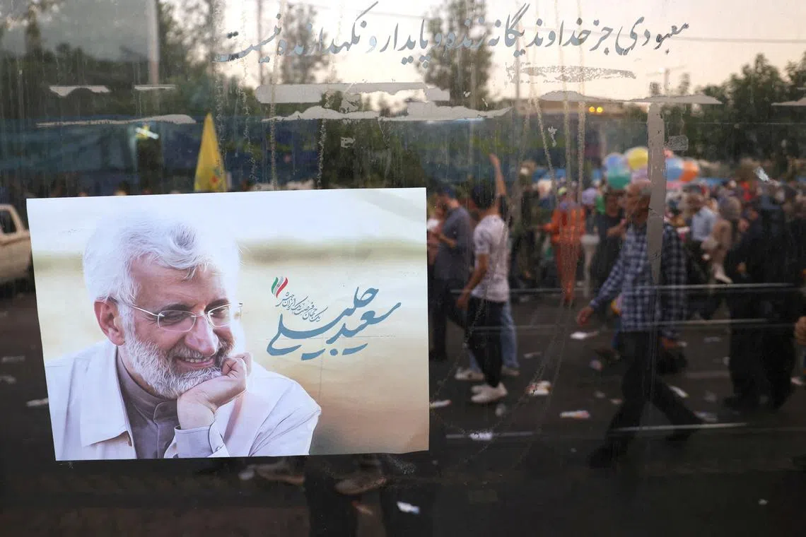 FILE PHOTO: A poster of Iranian presidential candidate Saeed Jalili is seen on a street in Tehran, Iran, June 25, 2024. Majid Asgaripour/WANA (West Asia News Agency) via REUTERS/File Photo