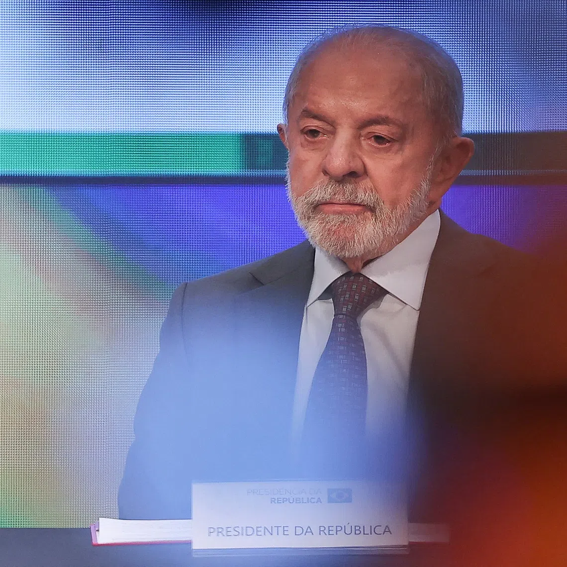 FILE PHOTO: Brazilian President Luiz Inacio Lula da Silva, a candidate for reelection for the Workers' Party (PT), sits on the day he announces a national ban on the operation of online betting companies, known locally as \"bets\" and other economic measures aimed at protecting families and working-class households, in Sao Paulo, Brazil, September 25, 2026. REUTERS/Amanda Perobelli/File Photo