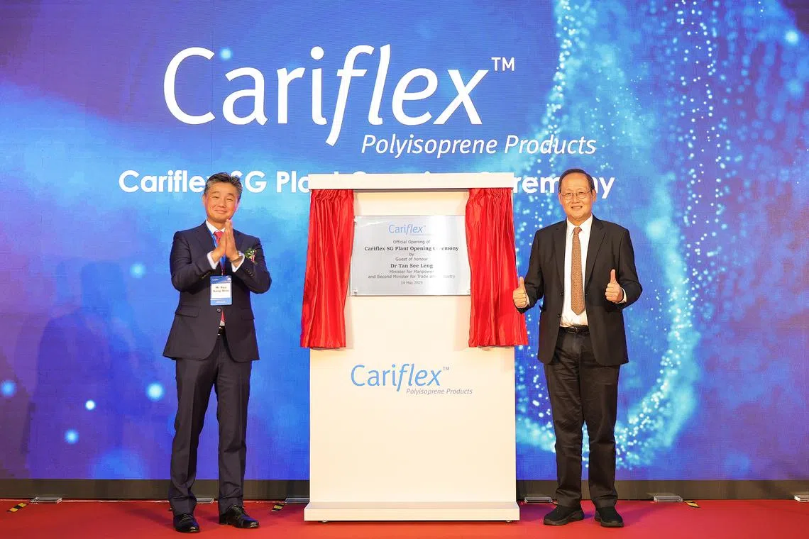 Minister for Manpower Tan See Leng (right) and Mr Ryu Sang Woo, CEO of Cariflex, at the Cariflex Singapore plant opening.