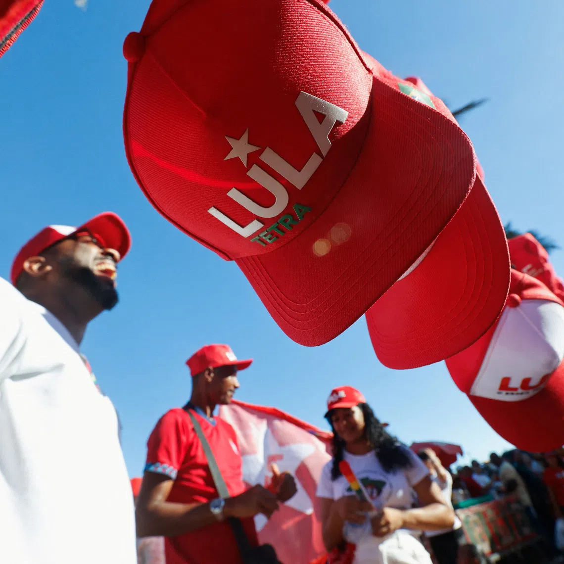 Caps are stringed together at a campaign rally of Brazilian President Luiz Inacio Lula da Silva, a candidate for reelection for the Workers' Party (PT), in Salvador, Brazil, September 29, 2026. REUTERS/Rafael Martins