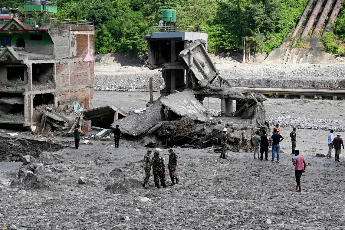 Rescuers continue grim search for Nepal flood survivors