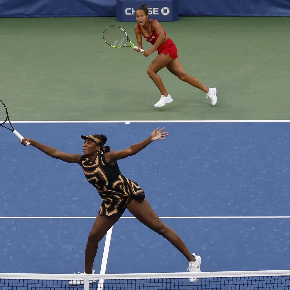 Sep 1, 2025; Flushing, NY, USA; Venus Williams (USA) reaches for a volley in front of partner Leylah Fernandez (CAN) against Ekaterina Alexandrova and Shuai Zhang (CHN) (both not pictured) on day nine of the 2025 US Open tennis championships at Billie Jean King National Tennis Center. Mandatory Credit: Geoff Burke-Imagn Images