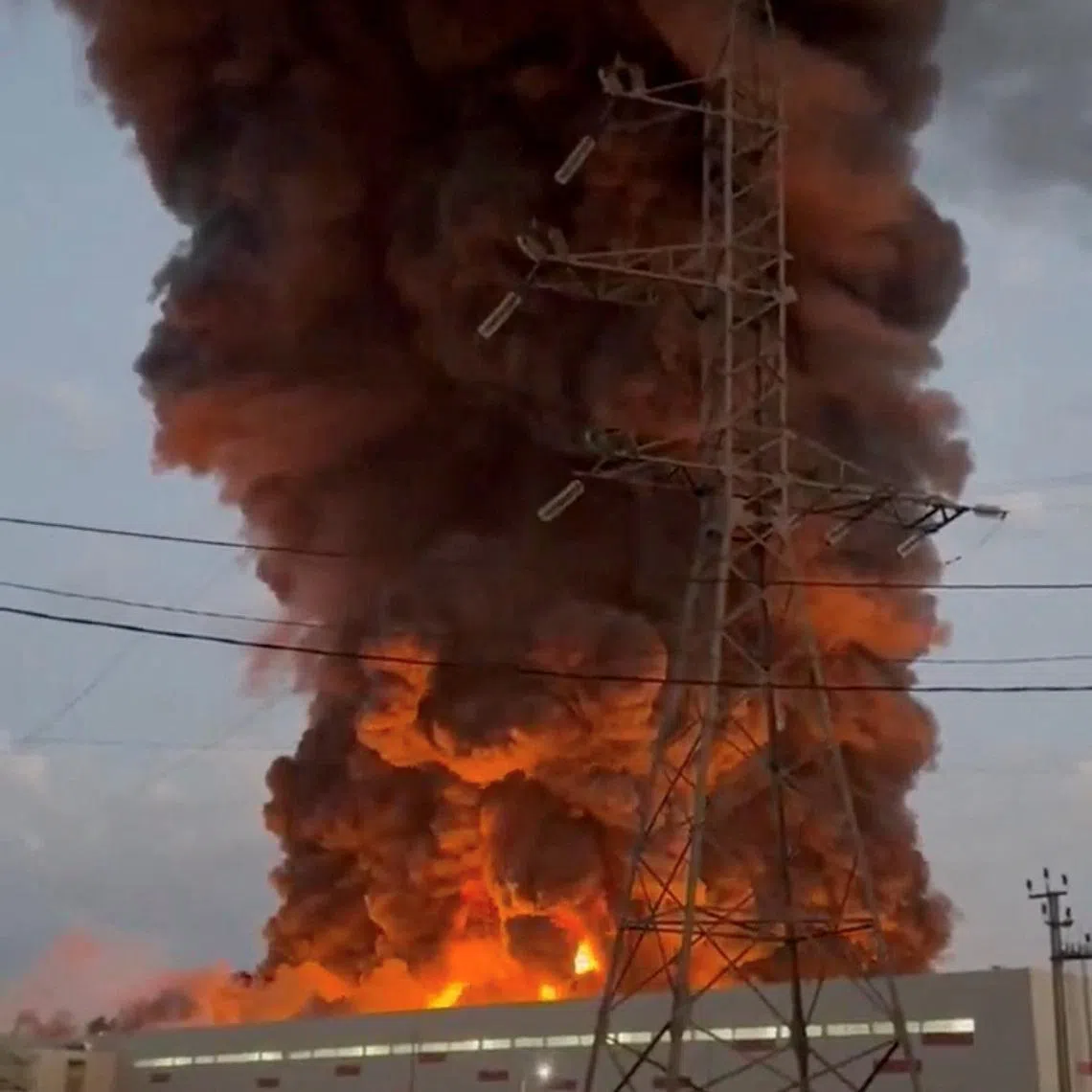 Smoke rises from a Wildberries warehouse on fire after an attack in Nevinnomyssk, Russia, July 22, 2026, in this still image obtained from social media video.  Social Media/via REUTERS