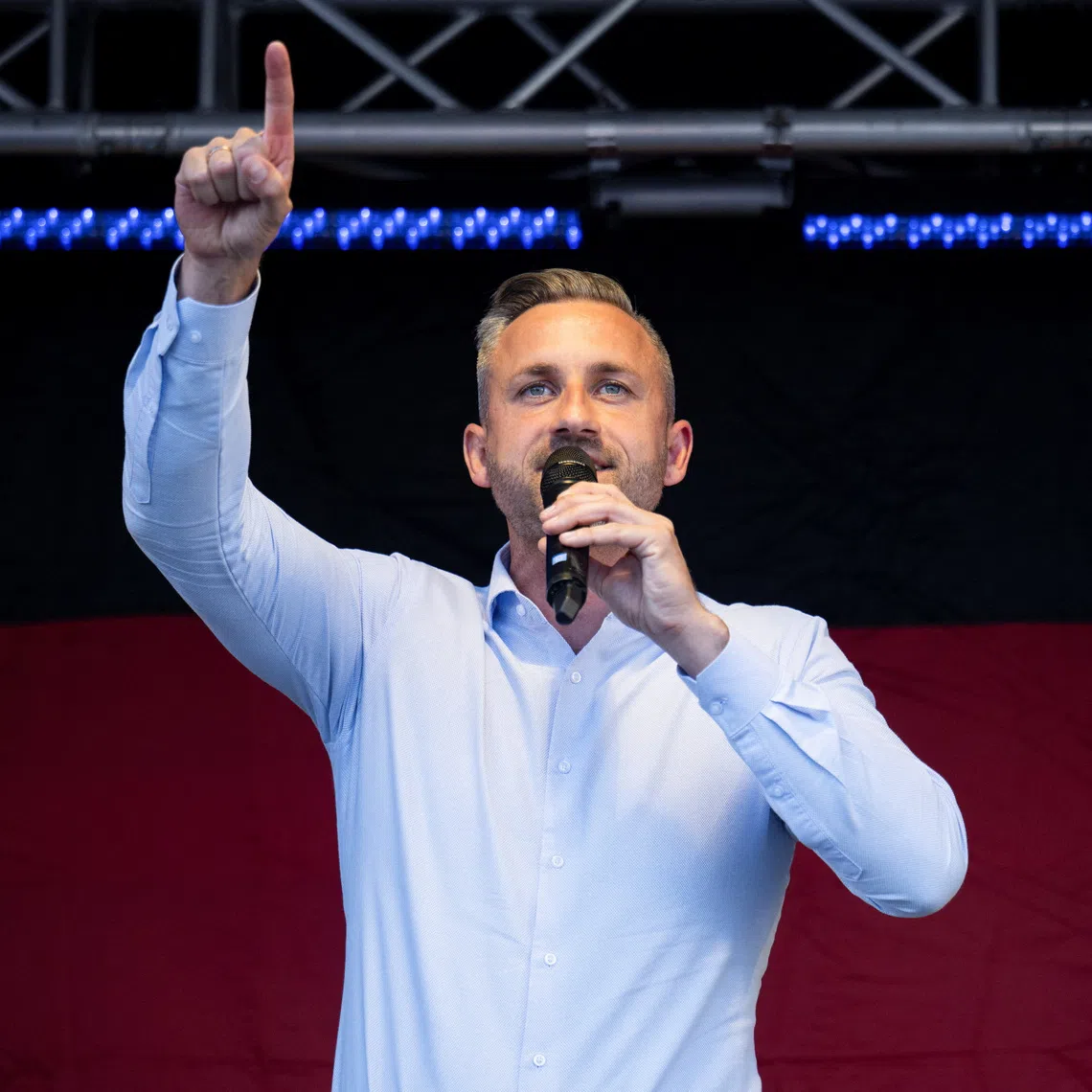 Ulrich Siegmund, top candidate of the far-right Alternative for Germany (AfD) party, speaks on stage during a campaign rally ahead of Germany's Saxony-Anhalt state election, in Naumburg, Germany August 24, 2026. REUTERS/Annegret Hilse