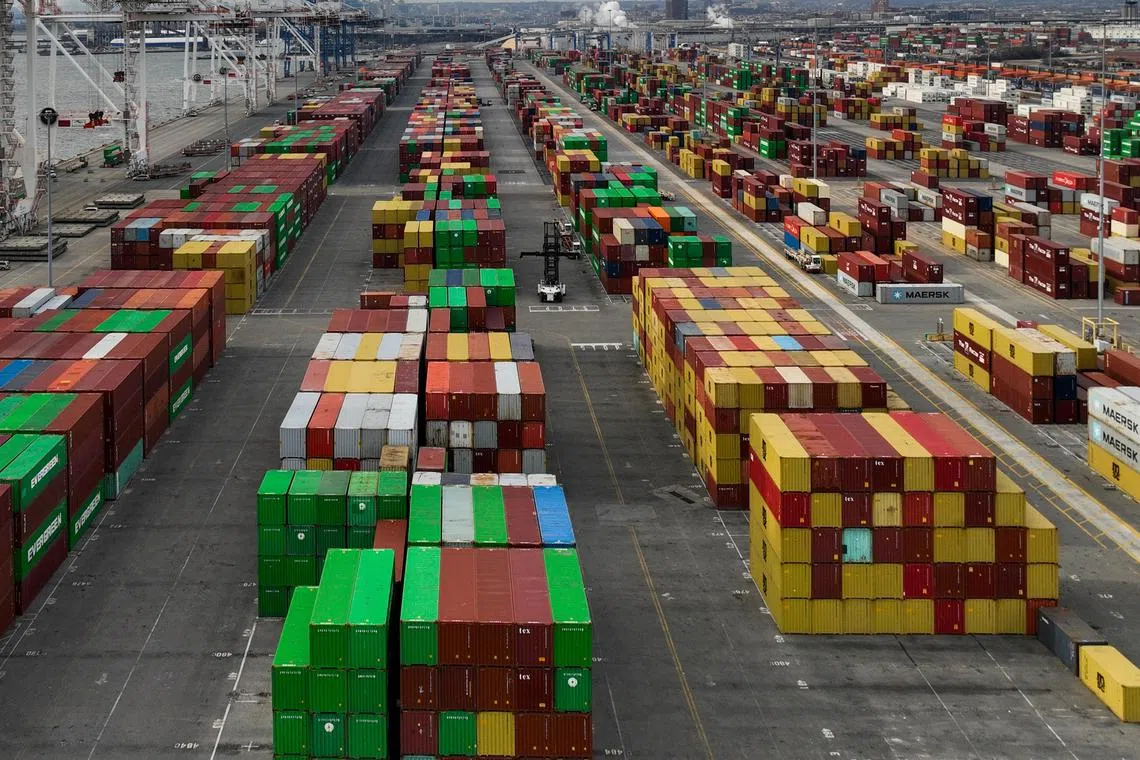 Containers are stacked at the Port of Baltimore, Feb. 22, 2025. Tariffs on imports from Canada and Mexico would go into effect on March 4, 2025, President Donald Trump said on Thursday morning, Feb. 27, 2025, claiming that those countries were still not doing enough to stop the flow of drugs into the United States. (Erin Schaff/The New York Times)