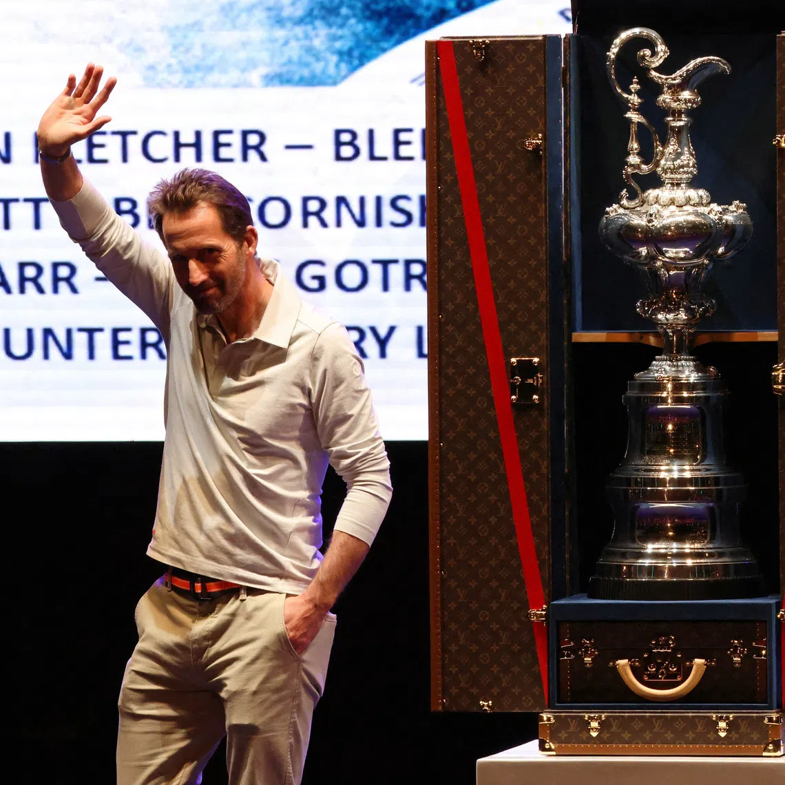 FILE PHOTO: Sailing - 37th America's Cup - New Zealand v Britain - Barcelona, Spain - October 19, 2024 Ineos Britannia's Ben Ainslie is seen on the podium during the trophy ceremony after the 37th America's Cup REUTERS/Nacho Doce/File Photo