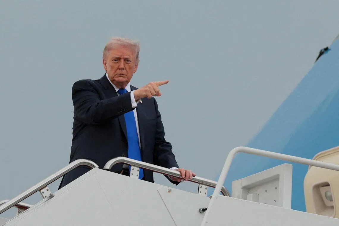 FILE PHOTO: U.S. President Donald Trump boards Air Force One en route to Palm Beach International Airport, at Joint Base Andrews, Maryland, U.S., April 24, 2026. REUTERS/Kylie Cooper/File Photo
