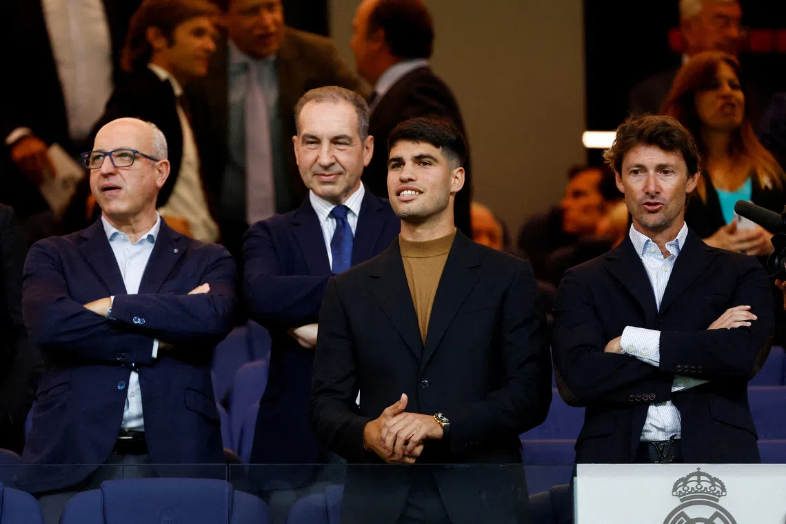 FILE PHOTO: Soccer Football - LaLiga - Real Madrid v FC Barcelona - Santiago Bernabeu, Madrid, Spain - April 21, 2024 Professional tennis player Carlos Alcaraz is pictured in the stands REUTERS/Susana Vera/File Photo