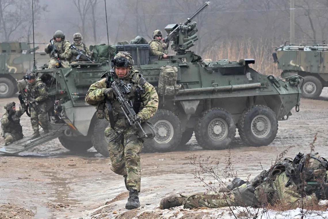US soldiers participate in a joint military drill between the US 2nd Infantry Division Stryker Battalion and the ROK 25th Infantry Division Army Tiger Demonstration Brigade at a training field in Paju on January 13, 2023. (Photo by Jung Yeon-je / AFP)