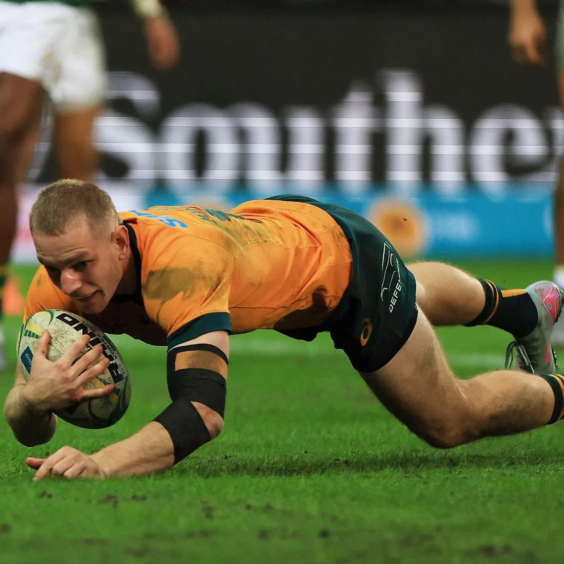 FILE PHOTO: Rugby Union - Rugby Championship - South Africa v Australia - DHL Stadium, Cape Town, South Africa - August 23, 2025  Australia's Max Jorgensen scores a try REUTERS/Esa Alexander/ File Photo