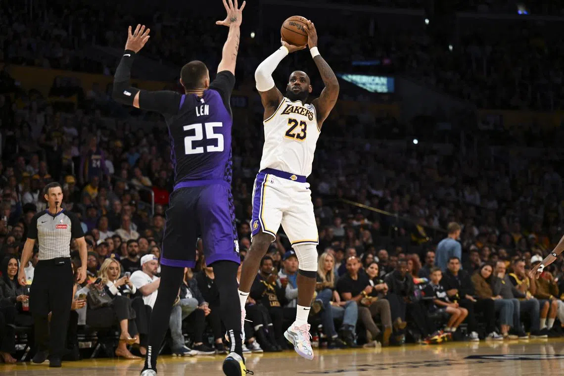 Los Angeles Lakers forward LeBron James shooting against Sacramento Kings centre Alex Len during the second half at Crypto.com Arena on Oct 26. The Lakers won the 