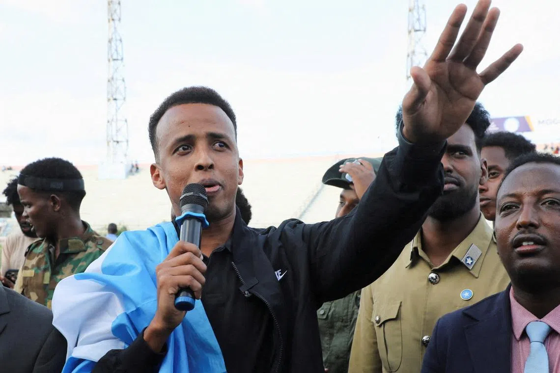 FILE PHOTO: Somali referee Omar Abdulkadir Artan, who was expected to officiate at matches during the 2026 FIFA World Cup but was denied entry to U.S., addresses fans at the Mogadishu stadium, in Mogadishu, Somalia, June 10, 2026 REUTERS/Feisal Omar/File Photo