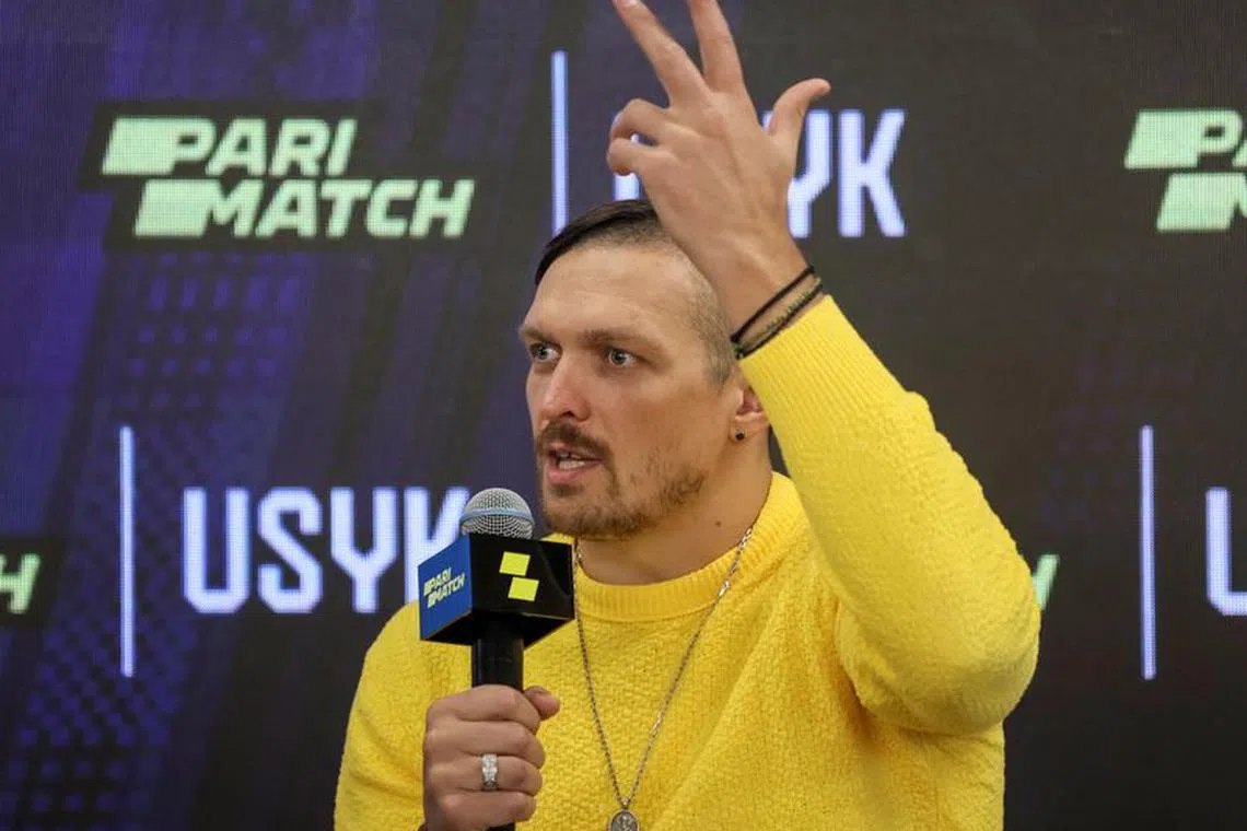 FILE PHOTO: Ukraine's unified world heavyweight boxing champion Oleksandr Usyk attends a news conference in Kyiv, Ukraine September 2, 2022. REUTERS/Gleb Garanich/File Photo