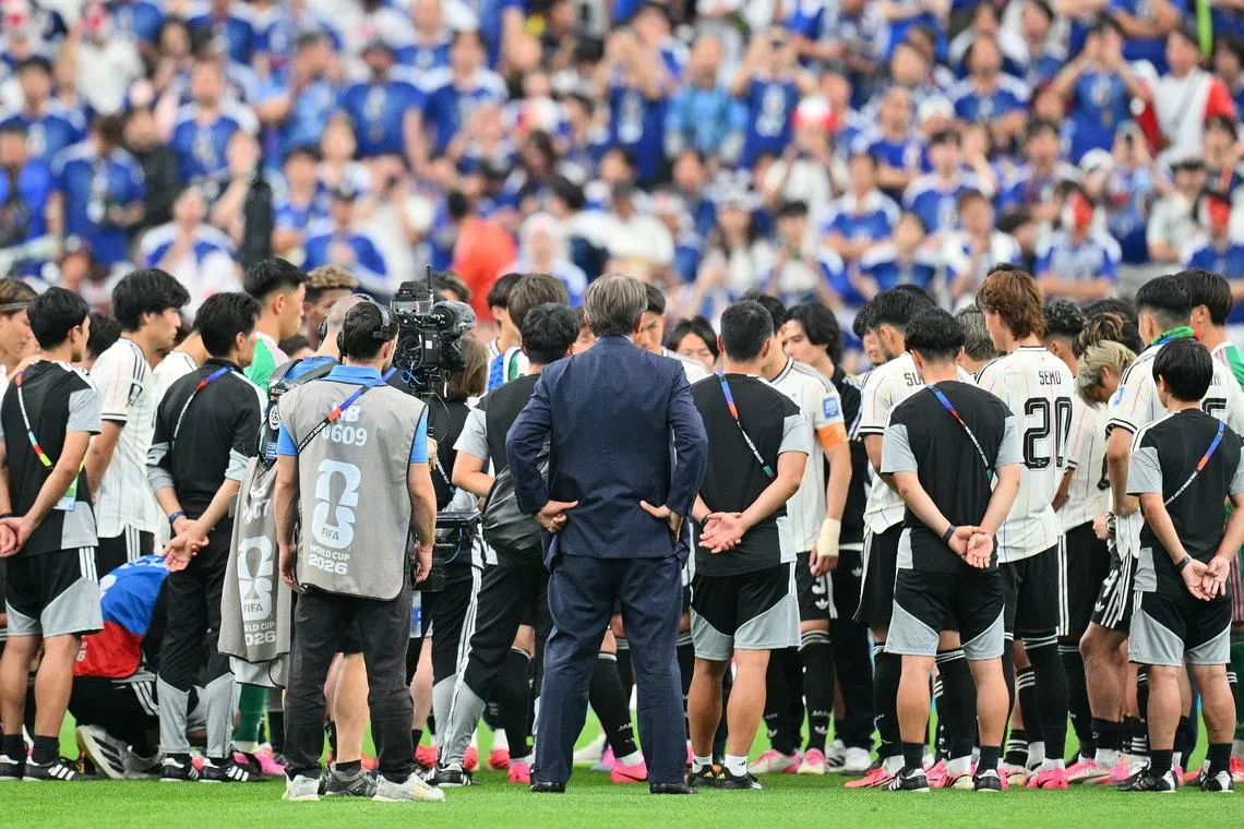 The team of Japan gathers on the pitch after the FIFA World Cup 2026 Round of 32 match Brazil against Japan, in Houston on June 29.
