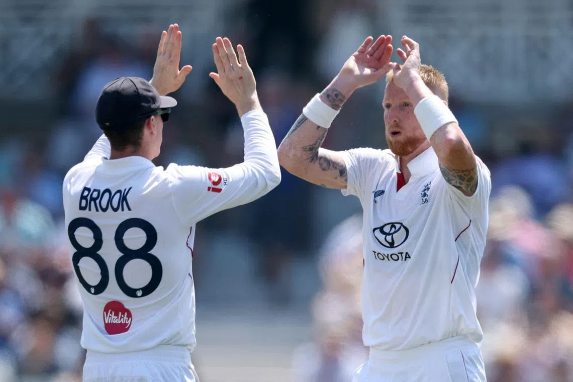 Cricket - England v New Zealand - Third Test - Trent Bridge Cricket Ground, Nottingham, Britain - June 26, 2026 England's Ben Stokes celebrates the wicket of Will O'Rourke with Harry Brook after a catch by Emilio Gay Action Images via Reuters/Andrew Boyers
