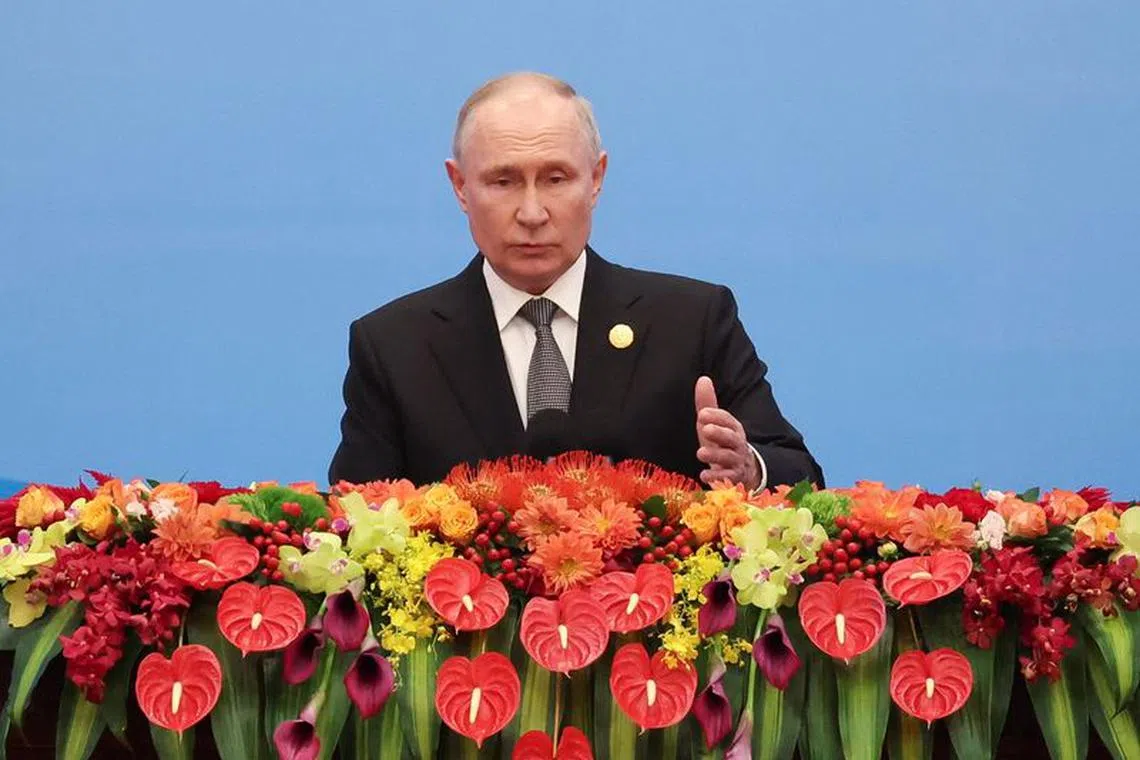 FILE PHOTO: Russian President Vladimir Putin speaks at the opening ceremony of the Belt and Road Forum (BRF), to mark the 10th anniversary of the Belt and Road Initiative at the Great Hall of the People in Beijing, October 18, 2023. REUTERS/Edgar Su/File Photo