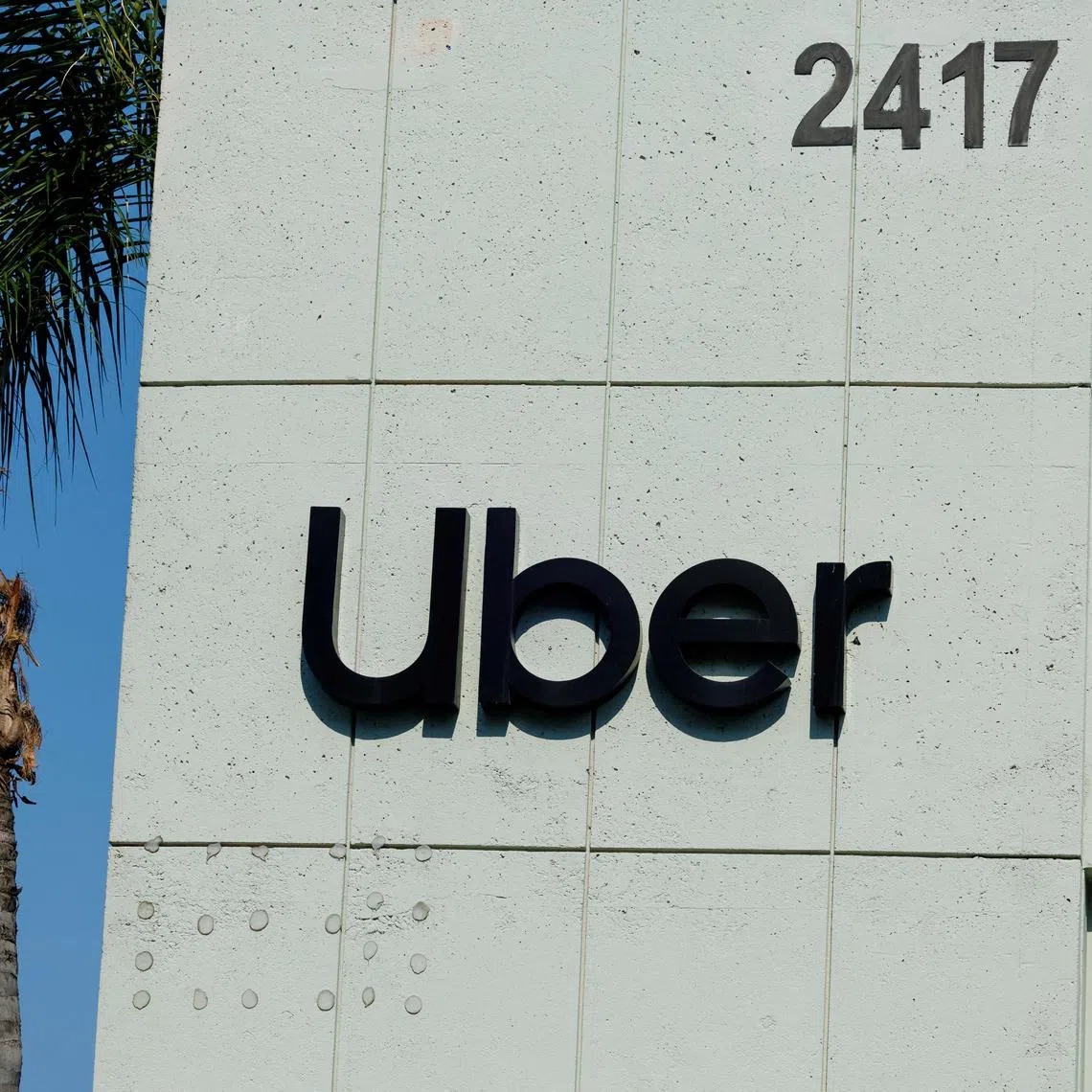 Companies including Uber will be allowed to trial commercial driverless services without a human presence for the first time in the UK.