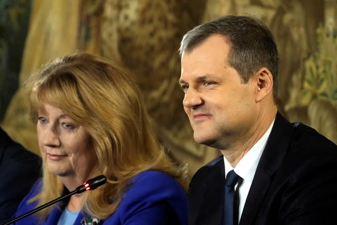 FILE PHOTO: Social Democrats leader Vilija Blinkeviciute and deputy leader Gintautas Paluckas attend a press conference after the party's general election victory, in Vilnius, Lithuania October 28, 2024. REUTERS/Ints Kalnins/File Photo
