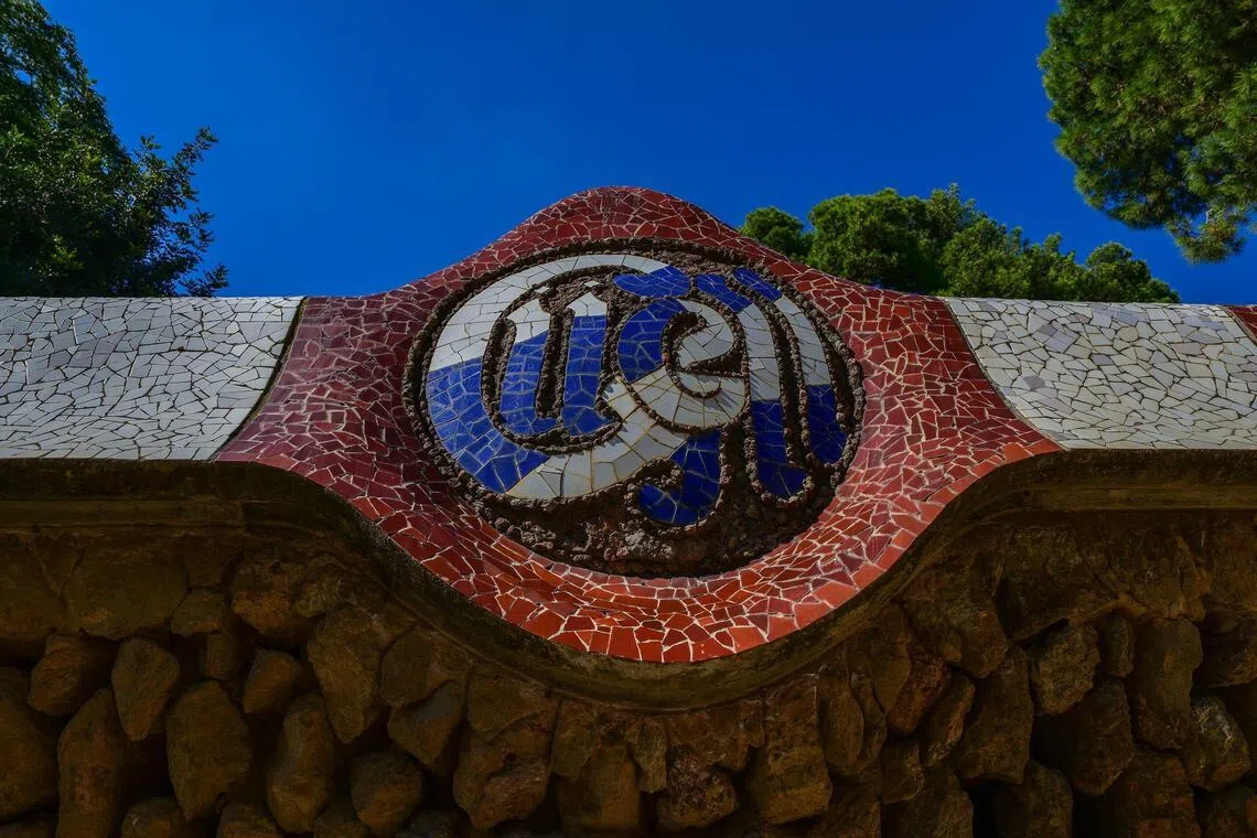 Antoni Gaudi’s signature Trencadis mosaics decorate Parc Guell in Barcelona.