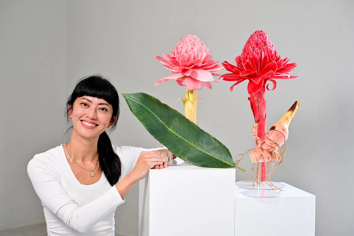 *SECOND MAIN PIX* ST20260825-202641200557-Lim Yaohui-yhpeili/ Paper artist Koh Pei Li with her Torch Ginger botanical sculpture which will be exhibited at Homo Faber 2026 in Venice, at New Bahru on Aug 25, 2026.  (ST PHOTO: LIM YAOHUI)