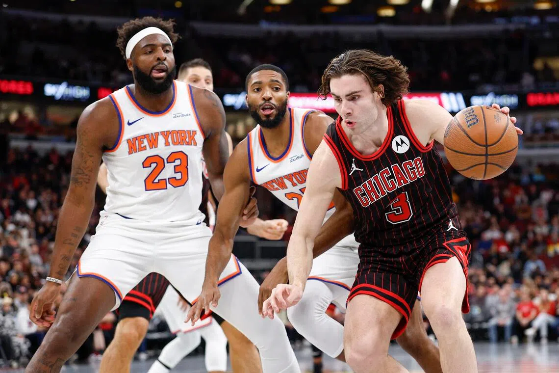 Chicago Bulls guard Josh Giddey driving to the basket against the New York Knicks during the first half of the 135-125 win at United Centre in Chicago on Oct 31, 2025.
