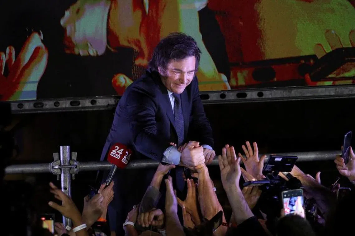 Argentine president-elect Javier Milei greets supporters after winning Argentina's runoff presidential election, in Buenos Aires, Argentina November 19, 2023. REUTERS/Cristina Sille/ File Photo