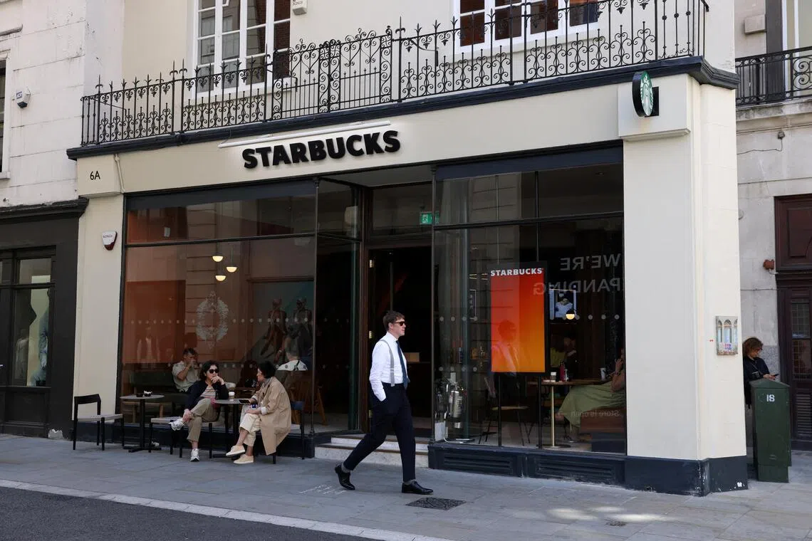 Starbucks said new chicken wraps, blue coconut beverages and its line of iced fruit drinks with customisable levels of caffeine attracted customers. 