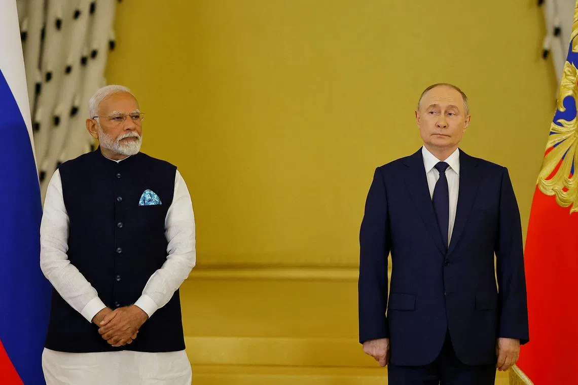 FILE PHOTO: Russia's President Vladimir Putin and India's Prime Minister Narendra Modi attend an awarding ceremony at the Kremlin in Moscow, Russia July 9, 2024. REUTERS/Evgenia Novozhenina/File Photo
