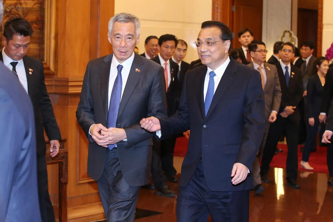Prime Minister Lee Hsien Loong (left) called on Chinese Premier Li Keqiang in Beijing during Mr Lee’s visit to China on 8 April 2018.