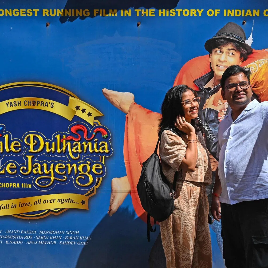 Moviegoers take a selfie ahead of the screening of the popular Bollywood Hindi film Dilwale Dulhania Le Jayenge at Maratha Mandir cinema in Mumbai.