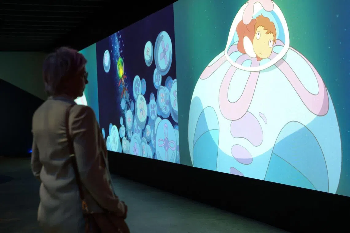 A visitor watches a video shown at the Academy Museum Studio Ghibli's Ponyo media preview in Los Angeles on Feb 12.