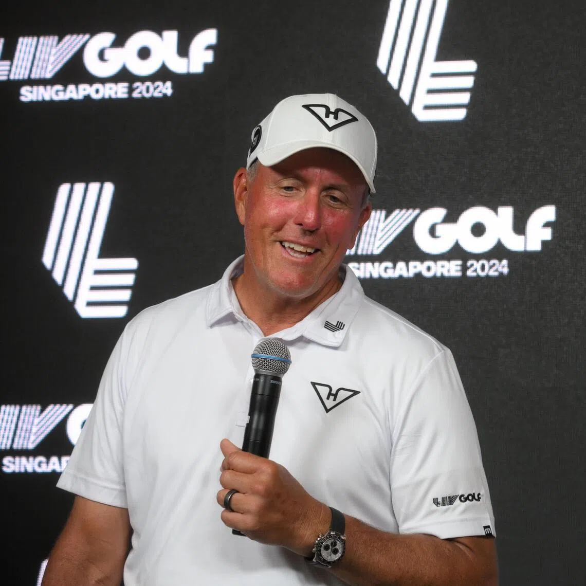 American golfers Phil Mickelson (left) and Bryson DeChambeau at a 2024 Liv Golf Singapore press conference.
