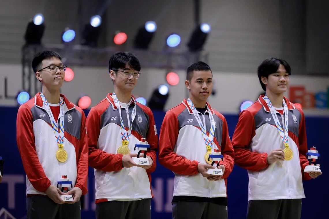 (From left) Raphael Tan, Julian Soh, Samuel Robson and Jonathan Lim with their gold medals.