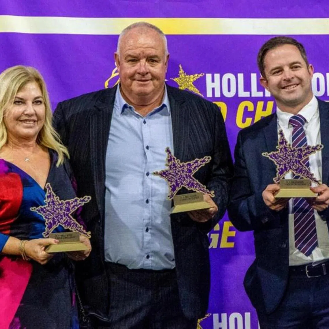 Mike de Kock - Mike de Kock (centre), with wife Diane, will this time return to Dubai in training partnership with their son Mathew (right).

PHOTO: DUBAI RACING CLUB
