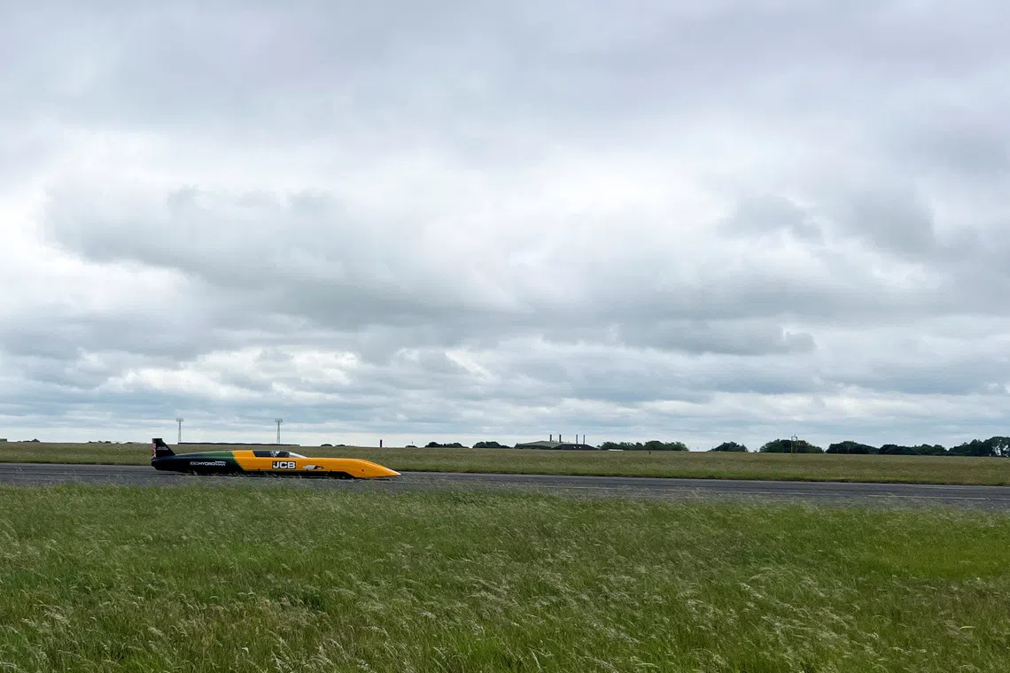 The Hydrogen-powered JCB Hydromax car on the runway during runway testing at RAF Wittering in Britain, on June 17.