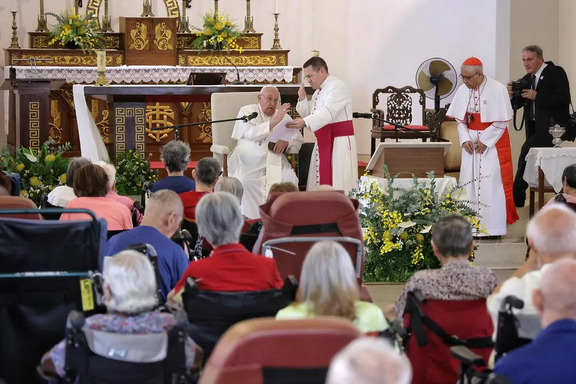 Pope Francis blessing elderly and sick residents at St Theresa's Home on Sept 13, 2024. ST PHOTO: KEVIN LIM pixpope13