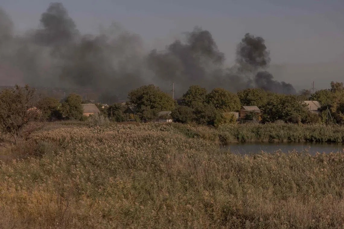 Smoke billowing following an air attack in Kostyantynivka, in Ukraine's eastern Donetsk region, on Oct 5.
