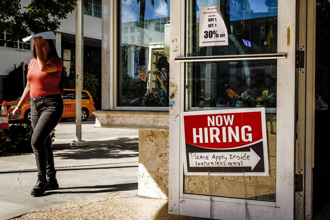 A business in Miami Beach, Fla., advertises for open positions on Thursday, Oct. 27, 2022. The labor market has remained stronger than expected even as the Federal Reserve has tried to get inflation under control. (Scott McIntyre/The New York Times)